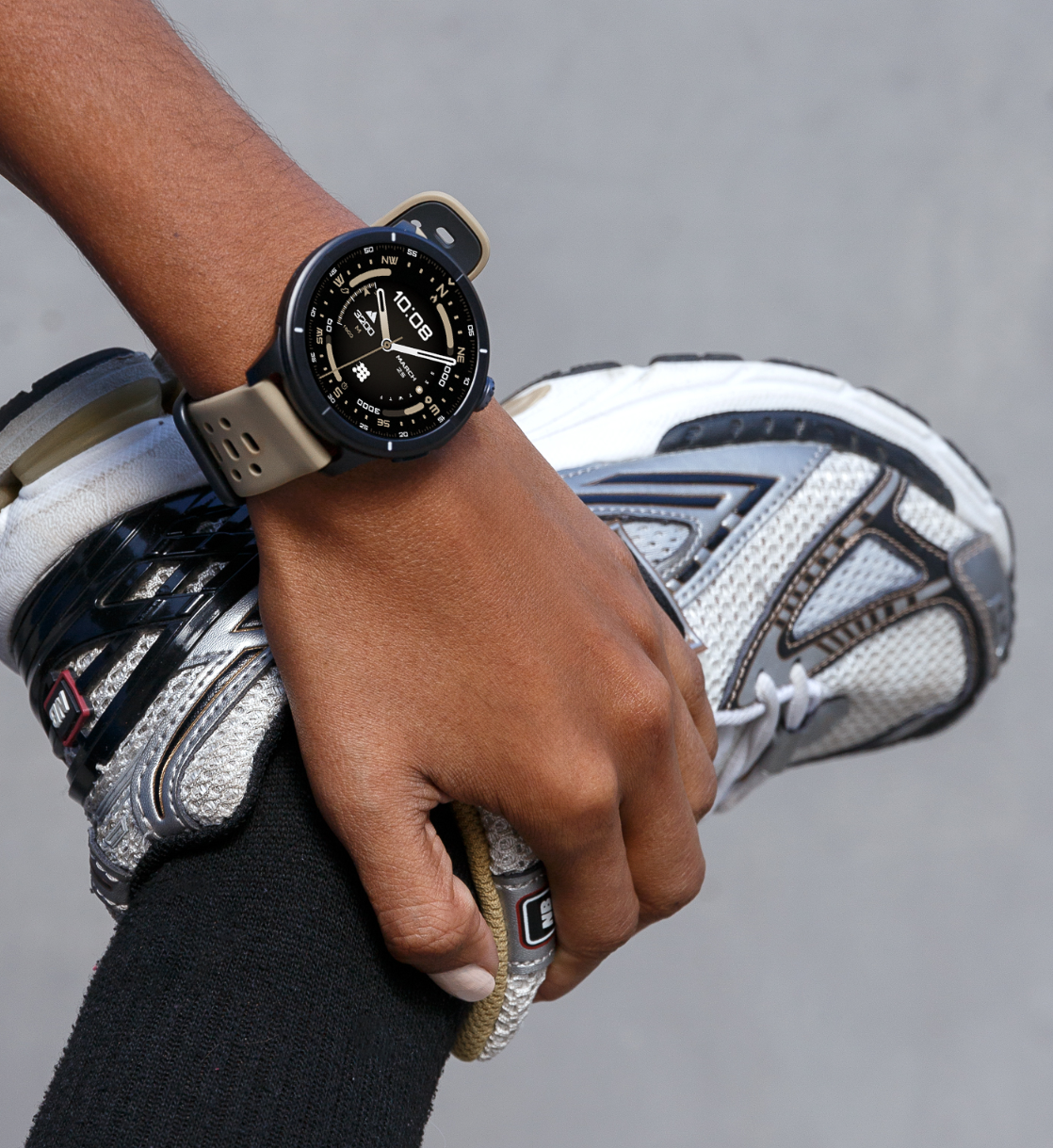 Cyclist tracking a GPS route with a Cubitt smartwatch